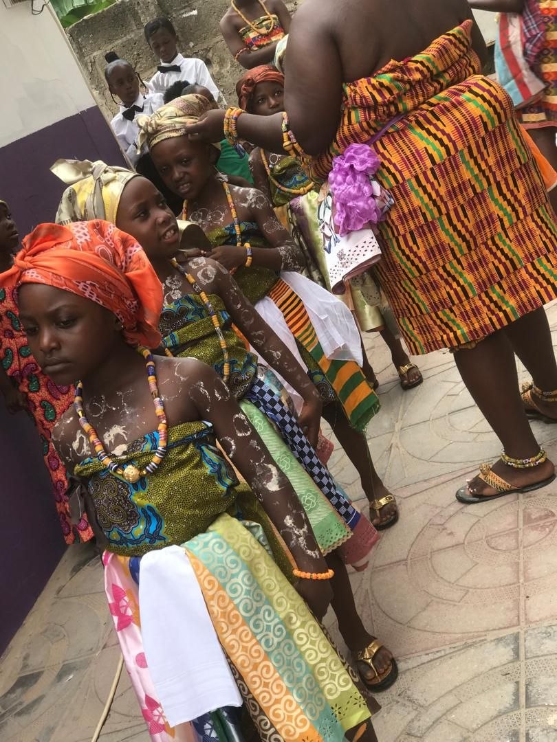 Students participating in cultural display